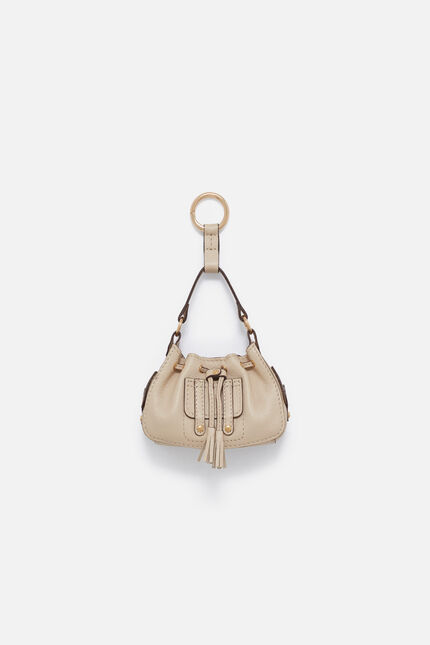 Charm Baby-Vic en cuir naturel ivoire femme